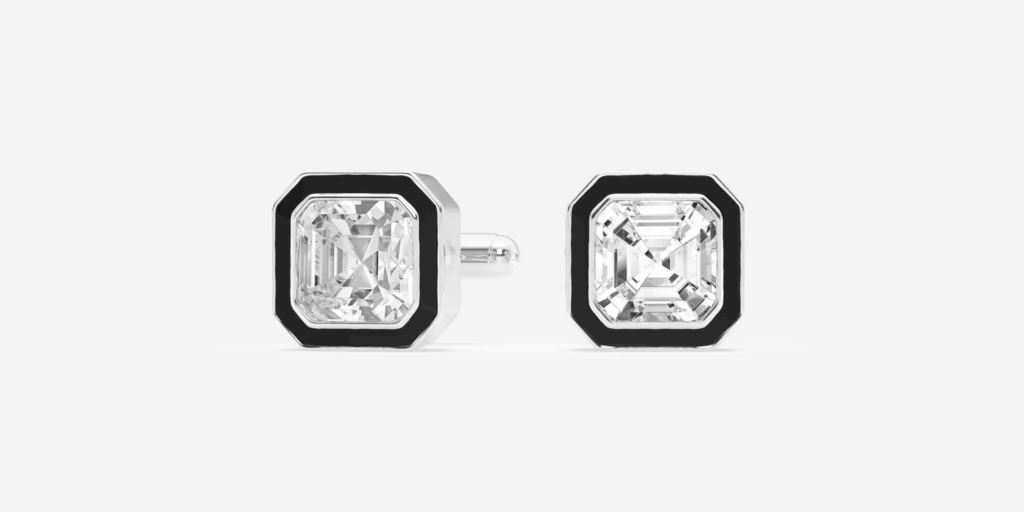 A pair of diamond stud earrings featuring large emerald-cut or Asscher-cut diamonds set in black and white metal bezels, displayed against a light gray background.RetryClaude can make mistakes. Please double-check responses.